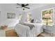 Bright bedroom with a queen-size bed and window view at 1758 Winfield Cir, Clearwater, FL 33756