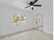 Bedroom with pool view and mirrored closet doors at 1758 Winfield Cir, Clearwater, FL 33756