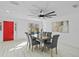 Bright dining area with wood table and gray chairs at 1758 Winfield Cir, Clearwater, FL 33756