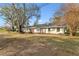 Ranch style home with spacious yard and mature trees at 1758 Winfield Cir, Clearwater, FL 33756
