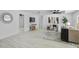 Bright living room with comfy seating, stylish decor, and hardwood floors at 1758 Winfield Cir, Clearwater, FL 33756