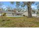 Inviting kidney-shaped pool in spacious backyard at 1758 Winfield Cir, Clearwater, FL 33756