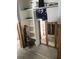 Unfinished basement with shelving and exposed walls, ready for renovation at 1766 Montana Ne Ave, St Petersburg, FL 33703