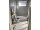 Partially renovated bathroom with toilet, bathtub, and exposed wall at 1766 Montana Ne Ave, St Petersburg, FL 33703