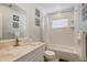 Clean bathroom with a tub, shower, and vanity at 1766 Montana Ne Ave, St Petersburg, FL 33703