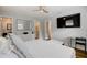 Main bedroom with king bed and access to bathroom and closet at 1766 Montana Ne Ave, St Petersburg, FL 33703