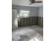 Unfinished bedroom with concrete floor and exposed walls at 1766 Montana Ne Ave, St Petersburg, FL 33703