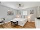 Bright bedroom with king-size bed and wood flooring at 1766 Montana Ne Ave, St Petersburg, FL 33703
