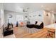 Bright living room with hardwood floors, sectional sofa, and coastal decor at 1766 Montana Ne Ave, St Petersburg, FL 33703