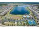 Community with lake, pool, playground, and tennis courts at 18811 Deer Tracks Loop, Lutz, FL 33558