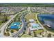 Stunning community with lake, pool, tennis, and playground at 18811 Deer Tracks Loop, Lutz, FL 33558