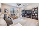 Living room with sectional sofa and fireplace at 18811 Deer Tracks Loop, Lutz, FL 33558