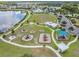 Community playground with play structures and shaded areas at 18811 Deer Tracks Loop, Lutz, FL 33558