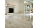 Living room with fireplace and sliding glass doors at 19018 Geraci Rd, Lutz, FL 33548