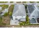 Two-story house with patio, fenced backyard, and additional outdoor space at 2704 W Gray St # B, Tampa, FL 33609