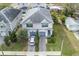 Two-story house with driveway, and landscaped yard at 2704 W Gray St # B, Tampa, FL 33609