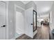 Entryway with hardwood floors, open staircase, and mirror at 2704 W Gray St # B, Tampa, FL 33609