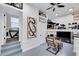 Home gym and office area with lofted storage at 2704 W Gray St # B, Tampa, FL 33609