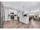 Modern kitchen with white cabinets, stainless steel appliances, and island at 2704 W Gray St # B, Tampa, FL 33609