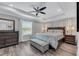 Large main bedroom with king-size bed and ensuite bathroom at 2704 W Gray St # B, Tampa, FL 33609
