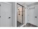 Large walk-in shower with subway tile and frameless glass door at 2704 W Gray St # B, Tampa, FL 33609
