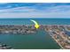 Aerial view of property, highlighting location and canal views at 2801 Hibiscus W Dr, Belleair Beach, FL 33786