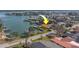 Waterfront home with private dock and boat slip, offering stunning water views at 2801 Hibiscus W Dr, Belleair Beach, FL 33786
