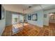 Dining room features tile floors and a chandelier at 2801 Hibiscus W Dr, Belleair Beach, FL 33786