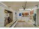 Clean and organized garage with storage shelves at 2801 Hibiscus W Dr, Belleair Beach, FL 33786