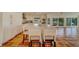 Eat-in kitchen with island and water views at 2801 Hibiscus W Dr, Belleair Beach, FL 33786