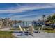 Enjoy waterfront views from this relaxing patio seating area at 2801 Hibiscus W Dr, Belleair Beach, FL 33786