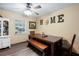 Simple dining area with wooden table and bench seating at 36441 Lake Pasadena Rd, Dade City, FL 33525