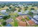 Aerial view showcasing a community of homes and landscape at 401 Dorchester Pl # 52, Sun City Center, FL 33573