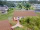 Top view of single story home with brown roof and walkway at 401 Dorchester Pl # 52, Sun City Center, FL 33573