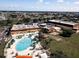 Large clubhouse with pool and bocce ball court at 401 Dorchester Pl # 52, Sun City Center, FL 33573