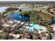 Resort-style pool, clubhouse, and golf course views at 401 Dorchester Pl # 52, Sun City Center, FL 33573
