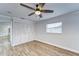 Spacious bedroom with ceiling fan and window at 401 Dorchester Pl # 52, Sun City Center, FL 33573
