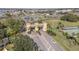 Gated community entrance with large archway and landscaping at 401 Dorchester Pl # 52, Sun City Center, FL 33573