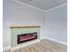 Modern electric fireplace with light green mantel at 401 Dorchester Pl # 52, Sun City Center, FL 33573