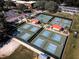 Aerial view of community pickleball courts at 401 Dorchester Pl # 52, Sun City Center, FL 33573