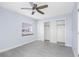 Spacious bedroom with light blue walls and large closet at 4611 W North B St # 129, Tampa, FL 33609