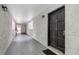 Interior hallway with dark wood doors and light-colored walls at 4611 W North B St # 129, Tampa, FL 33609