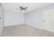 Spacious living room with tile floors and ceiling fan at 4611 W North B St # 129, Tampa, FL 33609