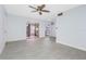 Open living area with tile flooring and access to patio at 4611 W North B St # 129, Tampa, FL 33609