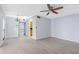 Living room with tile floor and access to kitchen at 4611 W North B St # 129, Tampa, FL 33609