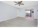 Living room with tile floors and access to patio at 4611 W North B St # 129, Tampa, FL 33609