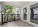 Bright screened porch with tile floors and access to the backyard at 4611 W North B St # 129, Tampa, FL 33609