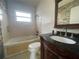 Bathroom with tub, toilet, vanity with granite countertop at 4617 49Th N Ave, St Petersburg, FL 33714