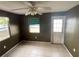 Bedroom with tile floors and access to backyard at 4617 49Th N Ave, St Petersburg, FL 33714