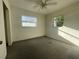 Bright bedroom with carpet flooring and ceiling fan at 4617 49Th N Ave, St Petersburg, FL 33714